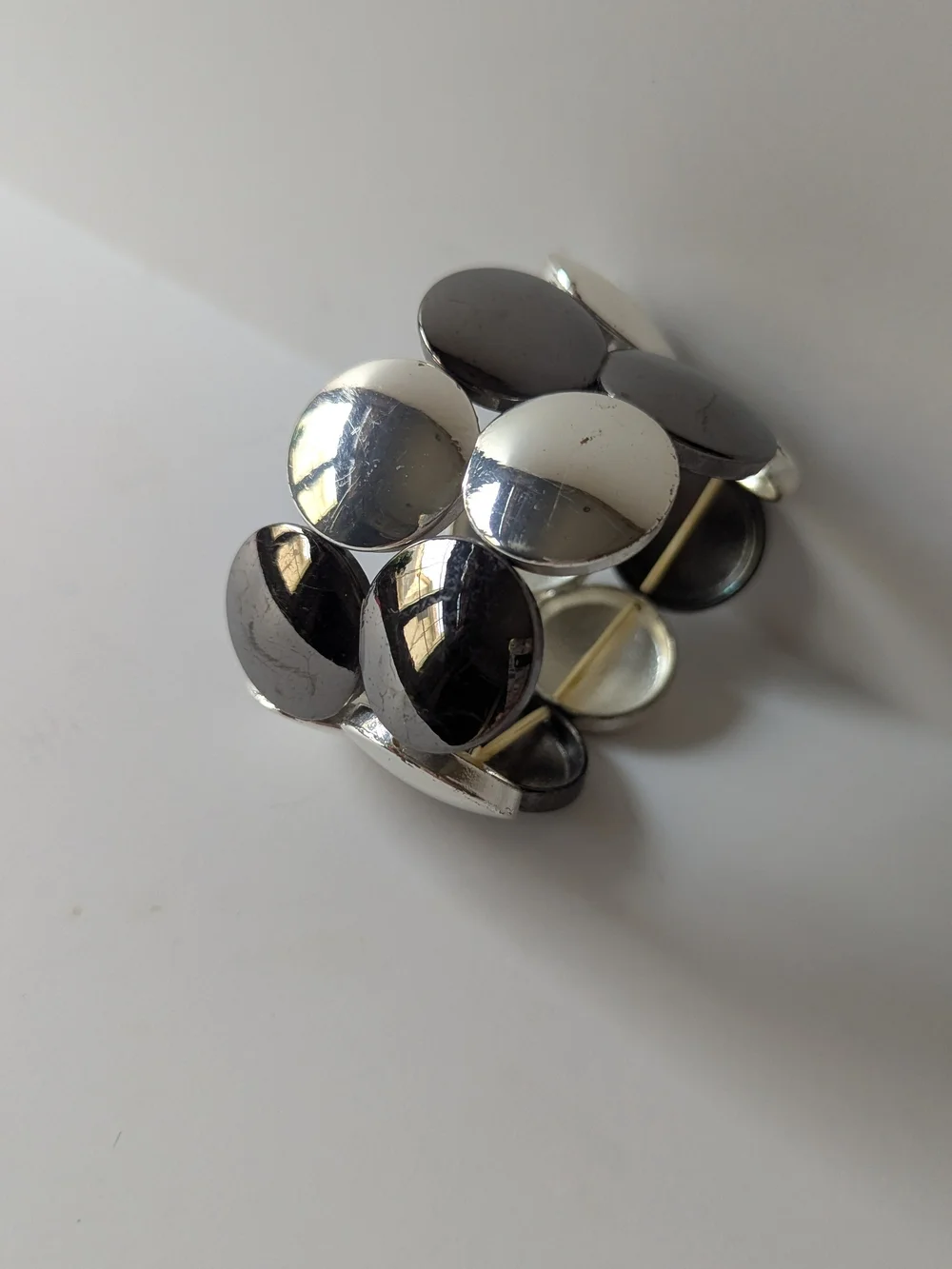 Round Metallic Stretch Bracelet in Silver and Gunmetal